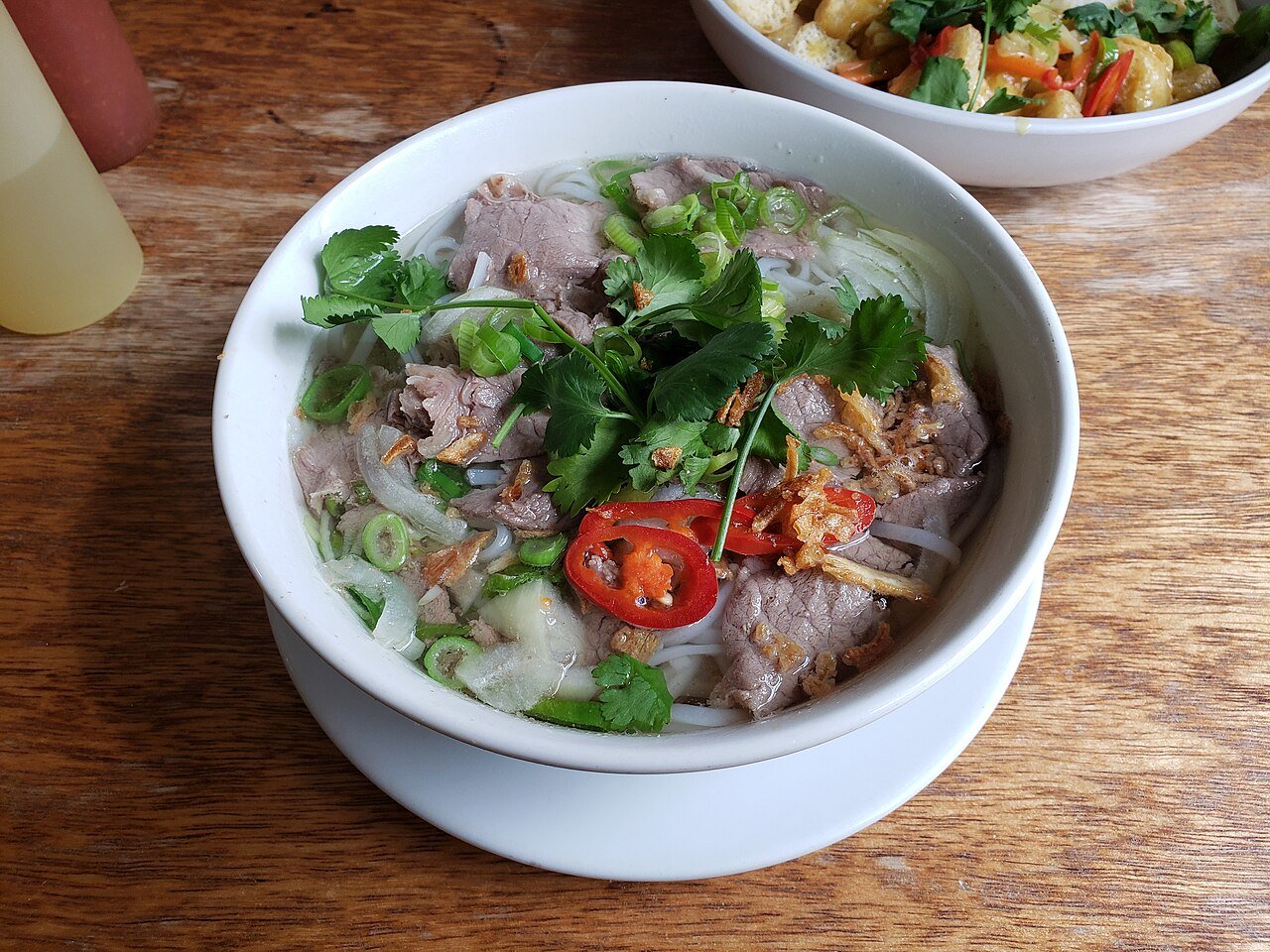 Representative photograph of Beef Pho. The photograph includes fresh chili garnish not included in this recipe.