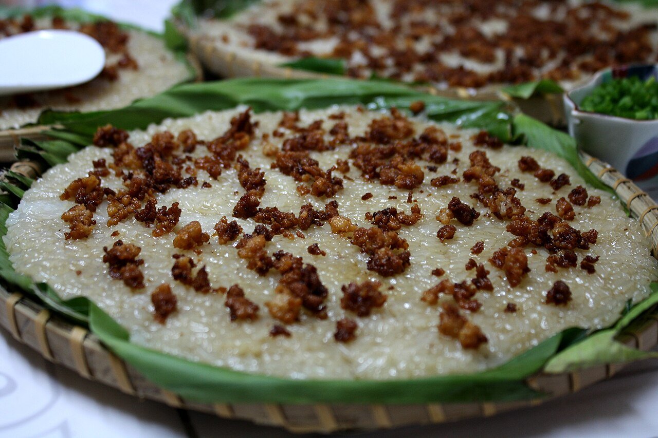 Representative photograph of Biko. The photograph shows a pale sticky-rice version with coconut curds; this recipe uses dark brown sugar and coconut caramel.