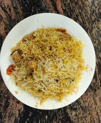 A representative chicken biryani photographed in Kolkata. Visible ingredients are not a complete recipe specification.