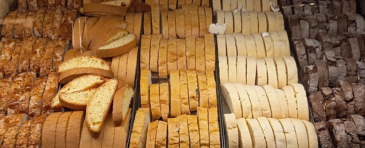 Representative photograph of Biscotti. The photograph shows several biscotti varieties; this recipe uses almonds and orange zest.
