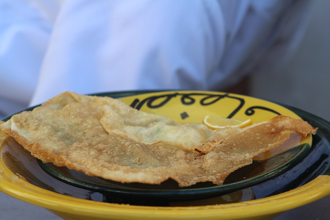 Representative photograph of Brik with Tuna. The source identifies brik but does not establish its filling. This recipe uses tuna and egg.