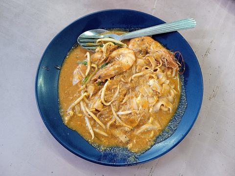Representative photograph of Char Kway Teow. The photograph shows a wetter regional serving than this stir-fried recipe.