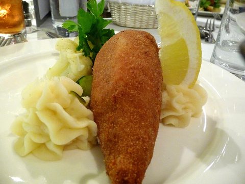 Representative photograph of Chicken Kyiv. The photograph includes mashed potatoes and garnish not included in this recipe.