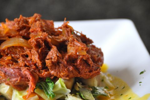 Representative photograph of Cuban Ropa Vieja. The photograph includes accompaniments not included in this recipe.