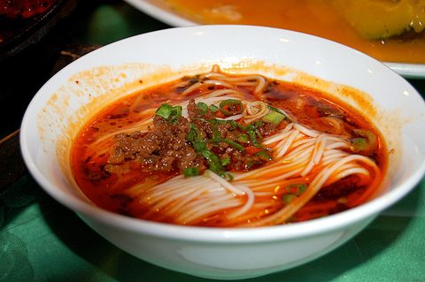 Representative photograph of Dan Dan Noodles. The photograph shows a brothier serving than this sesame-sauce recipe.