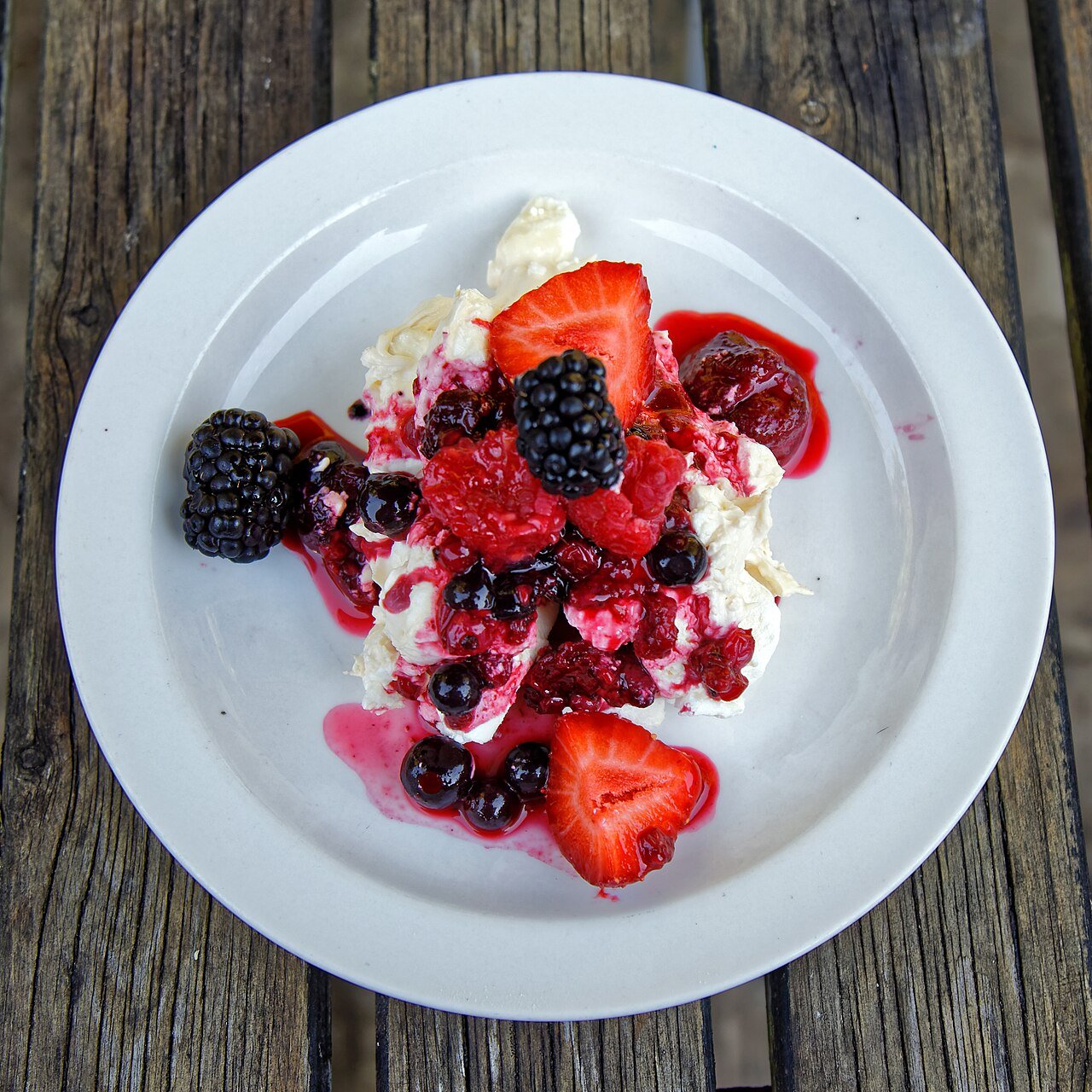 Representative photograph of Eton Mess. The photograph uses mixed berries; this recipe uses strawberries.