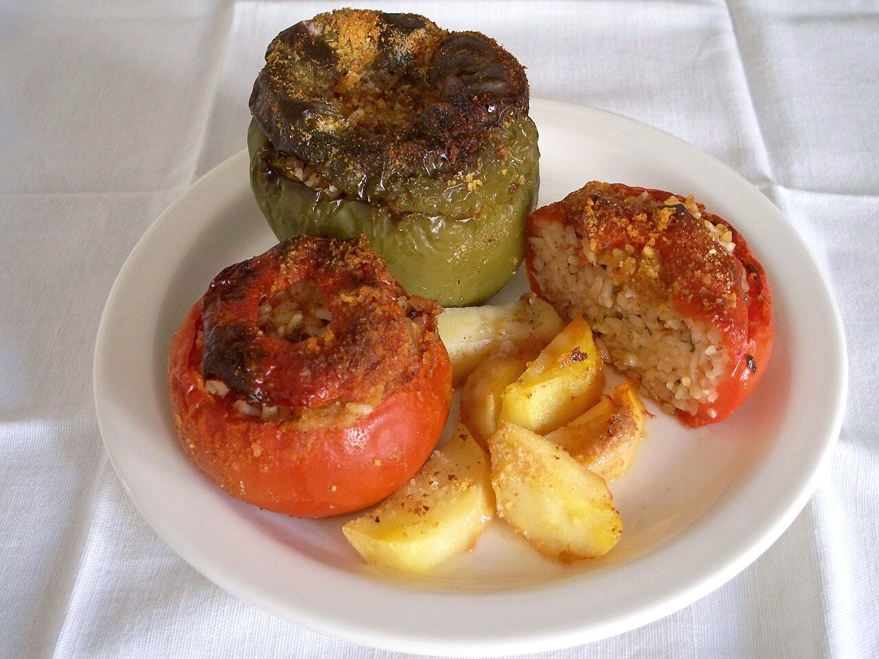 Representative photograph of Gemista. The photograph includes potatoes not included in this recipe.