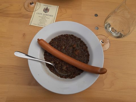 Representative photograph of German Lentil Soup. The photograph includes a sausage; this recipe makes vegetarian lentil soup without sausage.