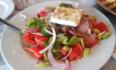 Greek salad with tomato, cucumber, red onion, green pepper and feta