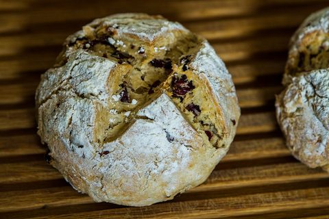 Representative photograph of Irish Soda Bread. The photograph includes dried fruit; this recipe makes an unsweetened wholemeal soda bread.