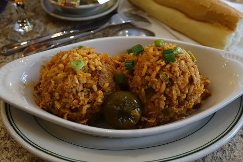 Representative photograph of Jambalaya. The photograph includes bread and peppers not included in this recipe.