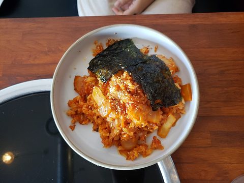 Representative photograph of Kimchi Fried Rice. The photograph includes nori and an egg topping not included in this recipe.