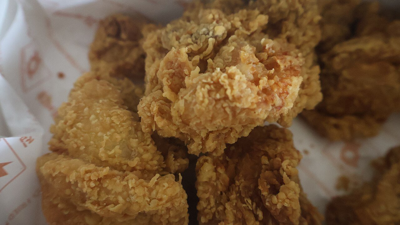 Representative photograph of Korean Fried Chicken. The photograph shows fried chicken before the sticky gochujang glaze used in this recipe.
