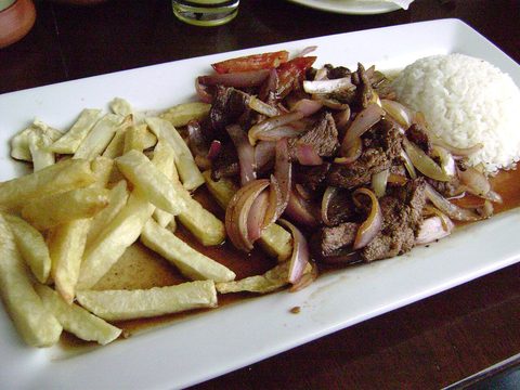 Representative photograph of Lomo Saltado. The photograph includes rice not included in this recipe.