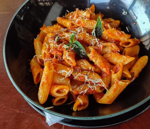 Representative photograph of Penne Arrabbiata. The photograph includes grated cheese not included in this recipe.