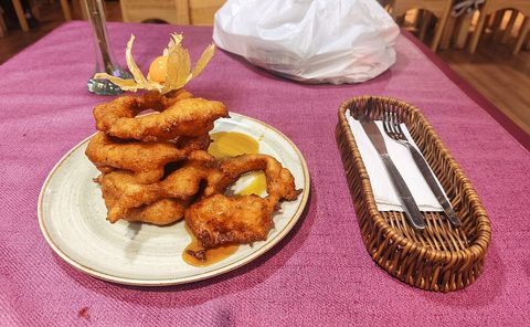 Representative photograph of Picarones. The photograph includes citrus garnish not included in this recipe.