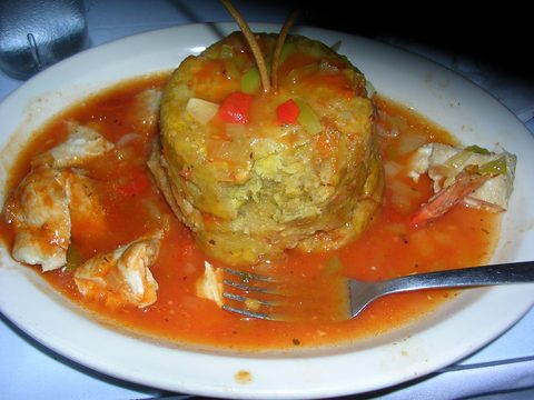 Representative photograph of Puerto Rican Mofongo. The photograph includes a meat sauce not included in this mofongo recipe.