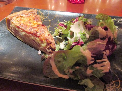 Representative photograph of Quiche Lorraine. The photograph includes a side salad not included in this recipe.