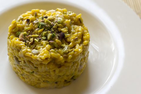 Representative photograph of Saffron Risotto. The photograph includes pistachio garnish not included in this recipe.