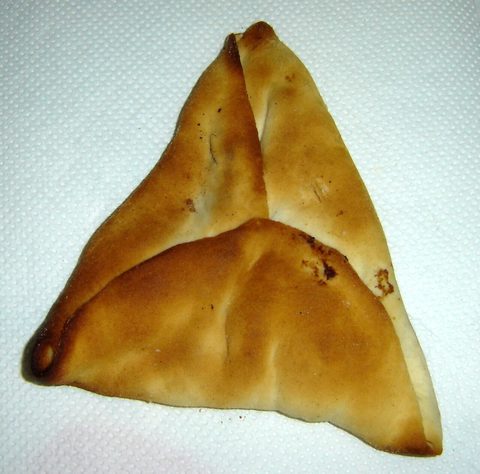 Representative photograph of Sfeeha. The photograph shows closed triangular sfeeha; this recipe makes open meat-topped rounds.