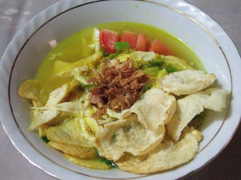 Representative photograph of Soto Ayam. The photograph includes crackers and fried shallots not included in this recipe.