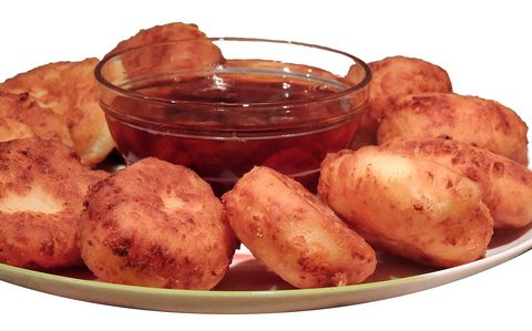 Representative photograph of Syrniki. The photograph includes jam and a different pancake shape than this recipe.