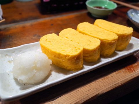 Representative photograph of Tamagoyaki. The photograph includes grated daikon, which is not part of this recipe.