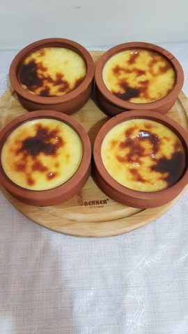 Representative photograph of Turkish Rice Pudding. The photograph shows oven-browned rice pudding; this recipe makes a stovetop pudding without a browned top.