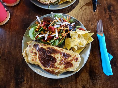 Representative photograph of Welsh Rarebit. The photograph includes salad and crisps not included in this recipe.