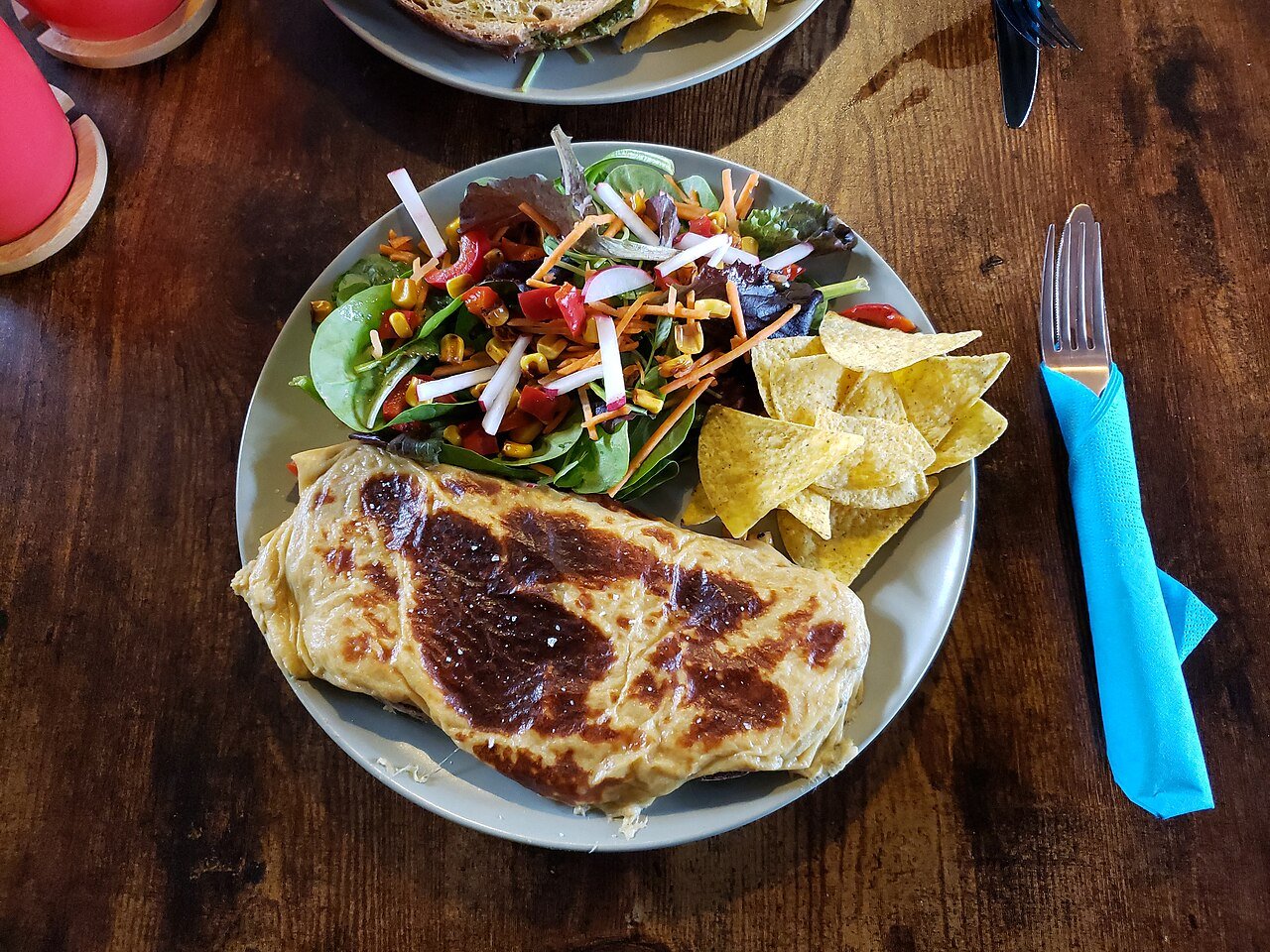 Representative photograph of Welsh Rarebit. The photograph includes salad and crisps not included in this recipe.